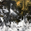 Large abstract landscape painting featuring dramatic black and white brushstrokes, creating a sense of motion and depth against a warm, earthy background.