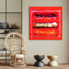 Vibrant abstract artwork | Geometric Art: Secret Path 38x38"
This captivating abstract painting features bold, geometric shapes in shades of red, orange, and white, creating a striking visual composition. The artwork is displayed in a modern home setting, complementing the neutral decor and natural elements like the woven chair.