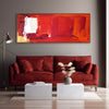 Vibrant Red Abstract Wall Art | Striking Modern Landscape Painting in Fiery Red Tones Framed on Wall Above Red Sofa