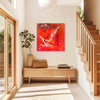 Red Canvas Art | Reaching Out 38x38"
Large abstract painting in red and white with dynamic brushstrokes displayed on a wooden console table in a modern entryway with wooden stairs.