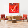 Red Canvas Art | Reaching Out 38x38"
Vibrant abstract square artwork in shades of red and white, displayed in a modern living room setting with wooden furniture and red accent chairs.