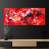 Vibrant abstract painting with bold strokes of red, orange, and black on a dark background