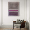 Geometric abstract artwork | Rothko-inspired canvas painting with neutral tones and vibrant purple accent | Displayed in modern interior with wooden armchair