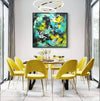 Vibrant Abstract Artwork | Large Colorful Canvas Painting Hanging in Modern Dining Room with Yellow Upholstered Chairs