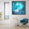 Large abstract blue canvas art with swirling, expressive brushstrokes in a modern, stylish living room setting.