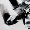 Abstract monochrome composition with intersecting brushstrokes and organic forms