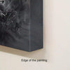 Monochrome abstract artwork depicting powerful, expressive brush strokes in shades of black and grey on a large canvas.