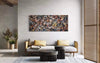 Large abstract landscape painting on wall in modern living room