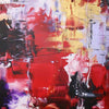 Colorful abstract artwork with vibrant red, yellow, and black brush strokes on a large canvas