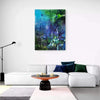 Large abstract landscape painting with earthy colors in a modern living room setting