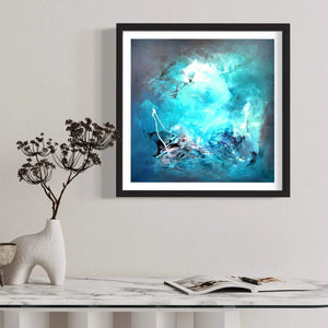 Captivating abstract artwork titled "Reflections" in a black frame on a white wall, surrounded by a minimalist decor featuring a ceramic figurine and a plant.