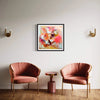 "Vibrant abstract art print in modern room setting with pink velvet chairs and gold accents"